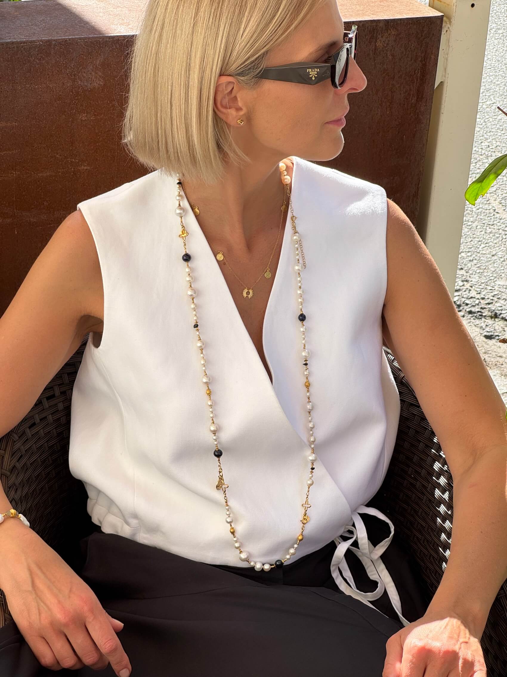Gold-plated chain with a sun