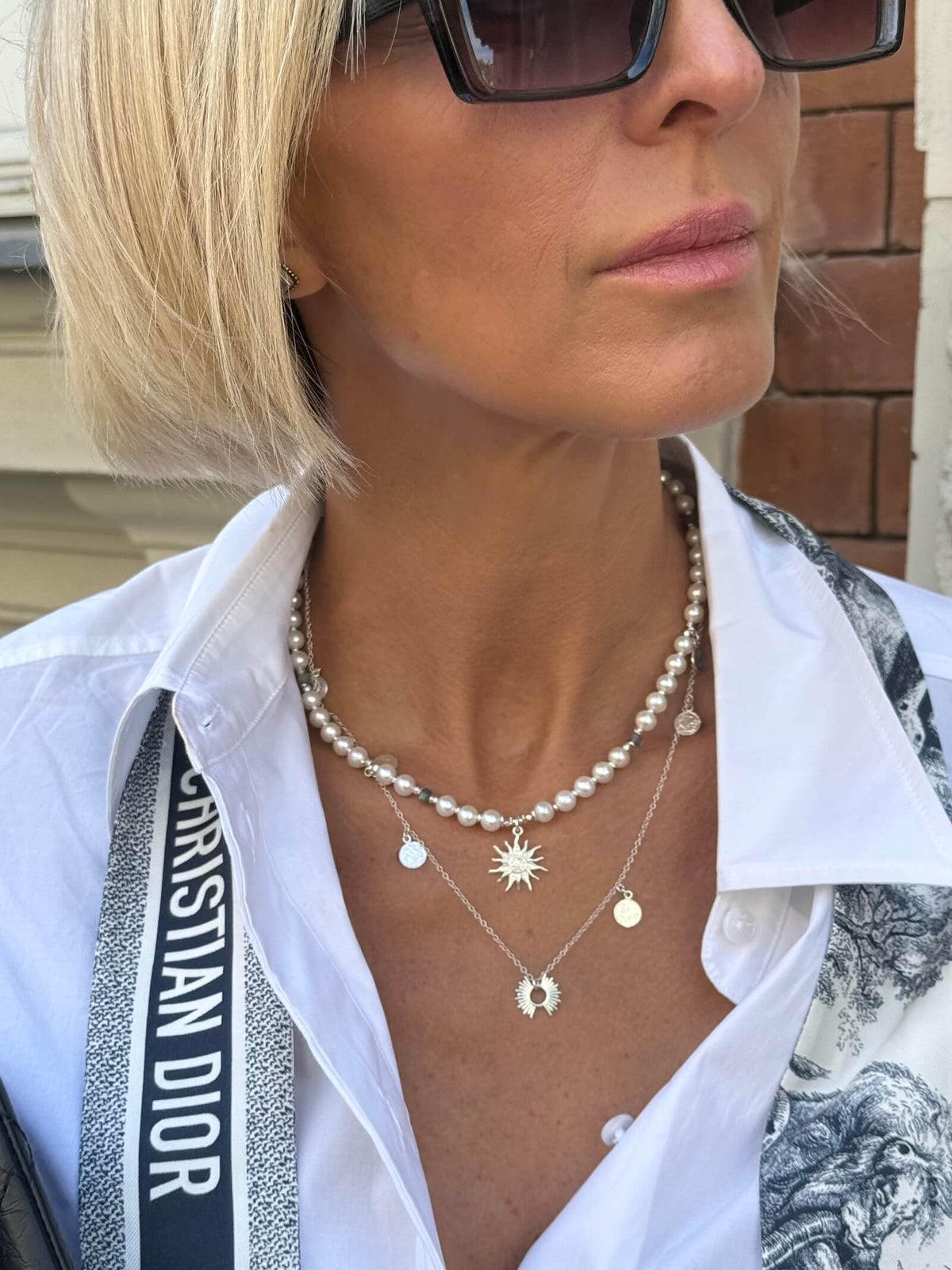 White Pearl Necklace in Silver with Sun Pendant