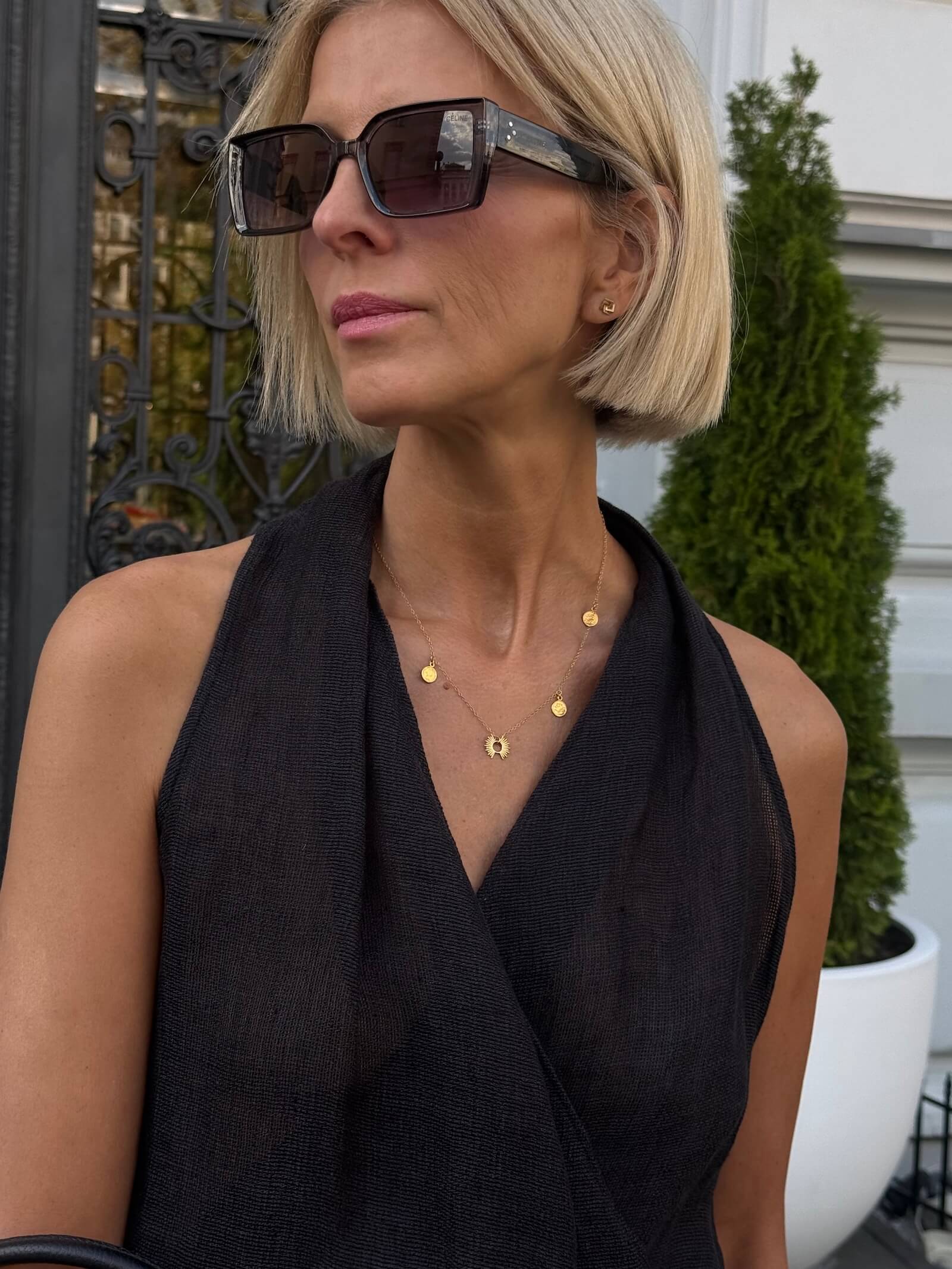 Gold-plated chain with a sun