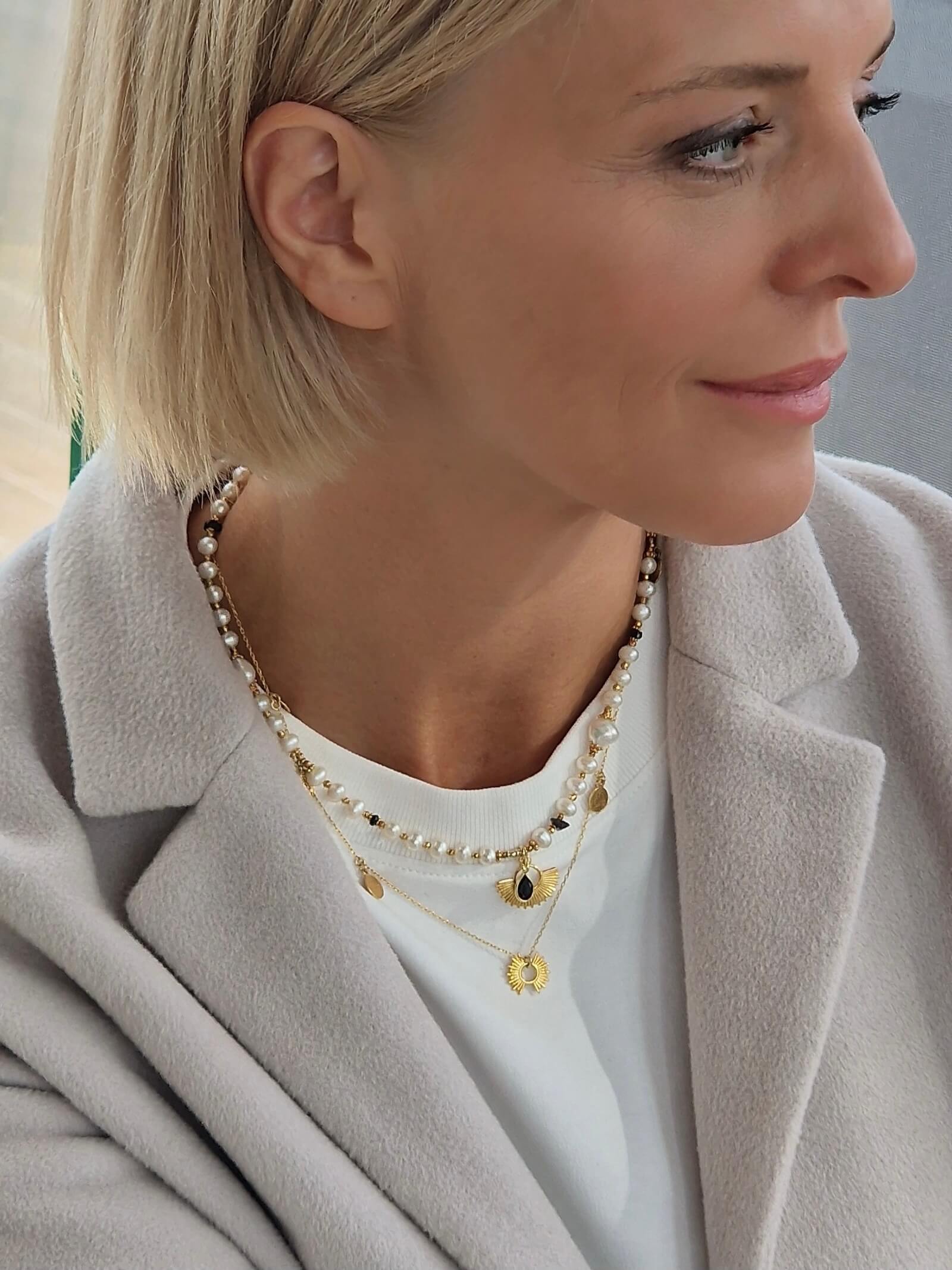 White Pearl Necklace with a Sun and Tourmaline Pendant